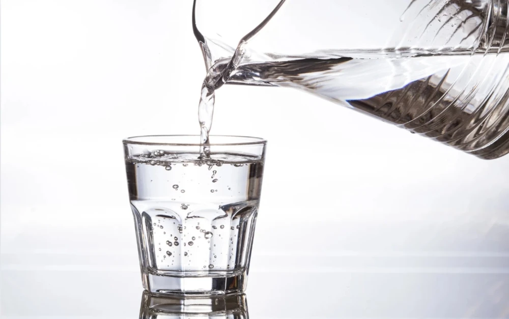 water bij de vergadering